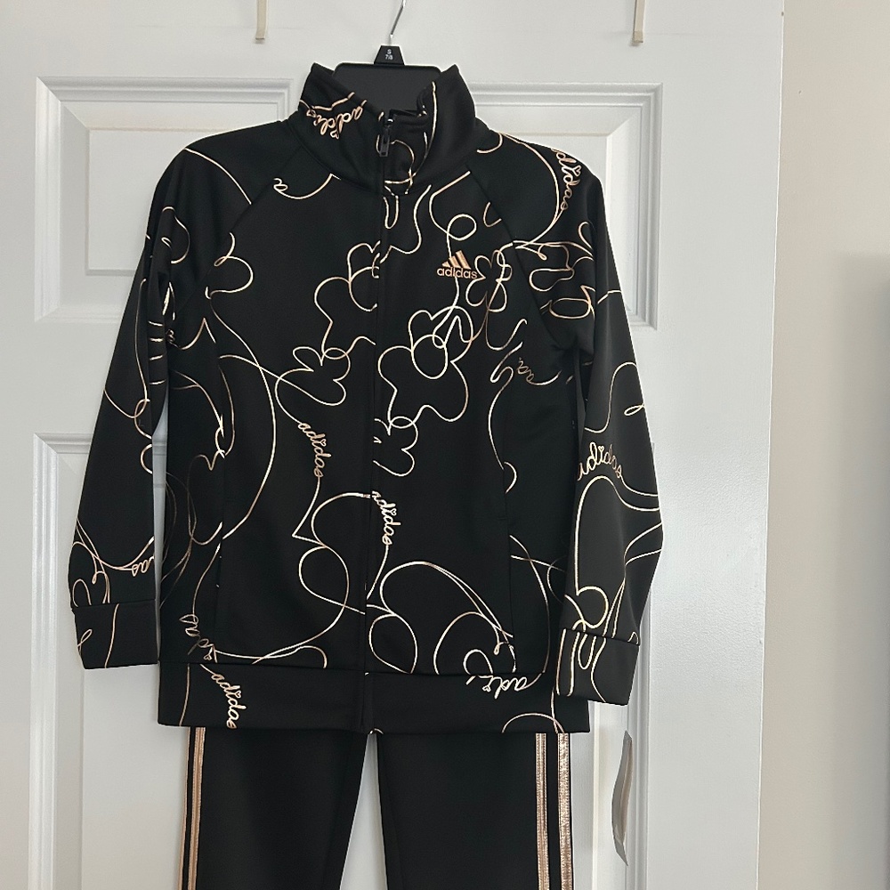 Girls Adidas track suit